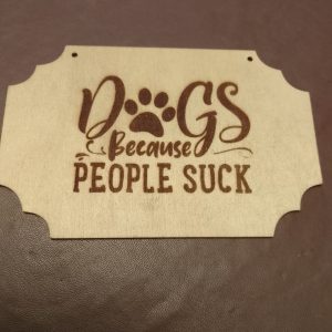 'Dogs - because people suck' wooden sign