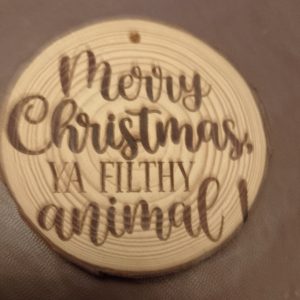 'You filthy animal' solid wood coaster